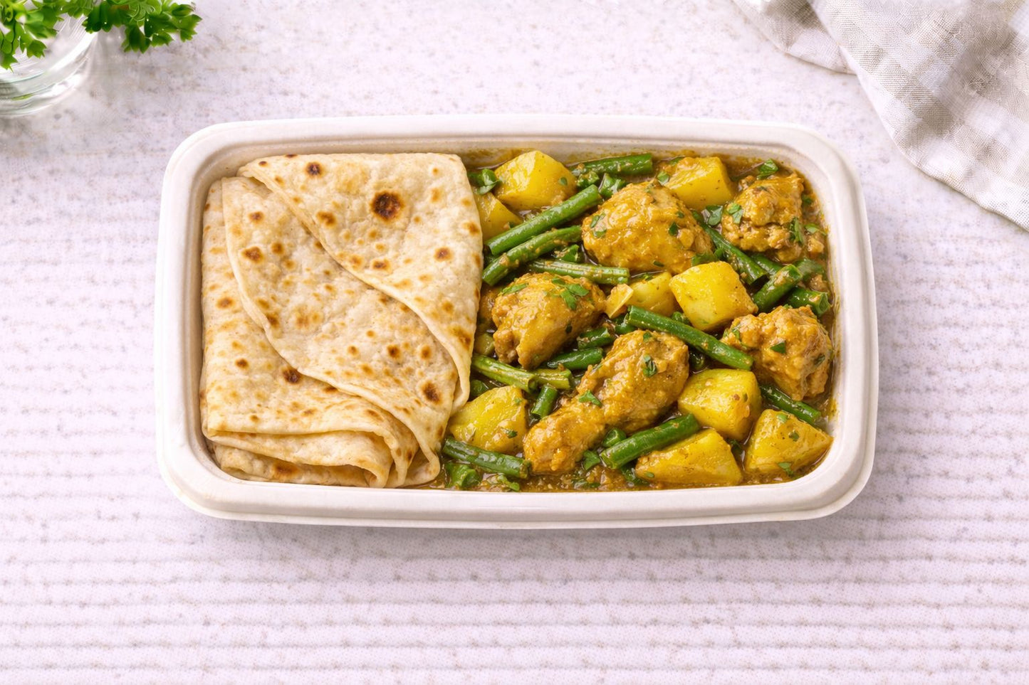 Roti plaat met kip kerrie